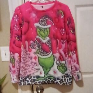 Festive Pink Grinch Sweater